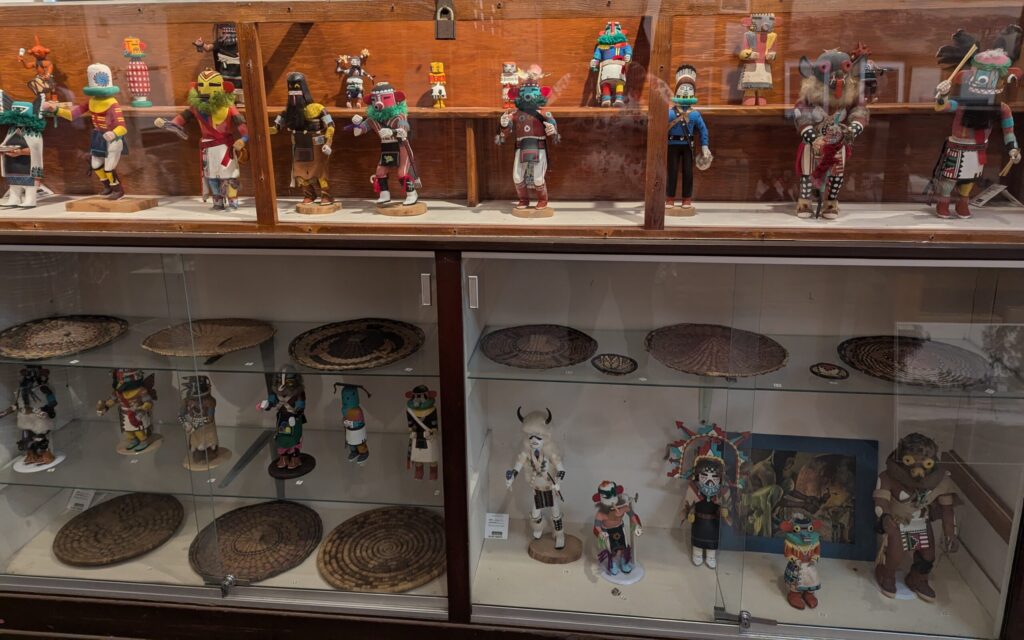 Hopi Kachina dolls in a glass case